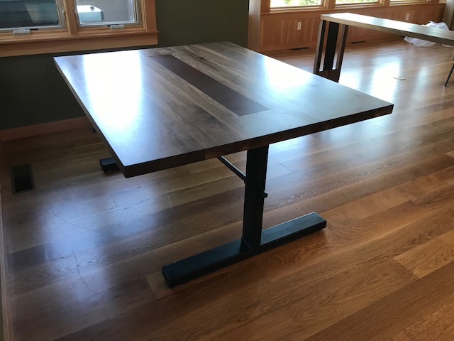 Walnut dining table with steel inlay. Stowe, VT residence